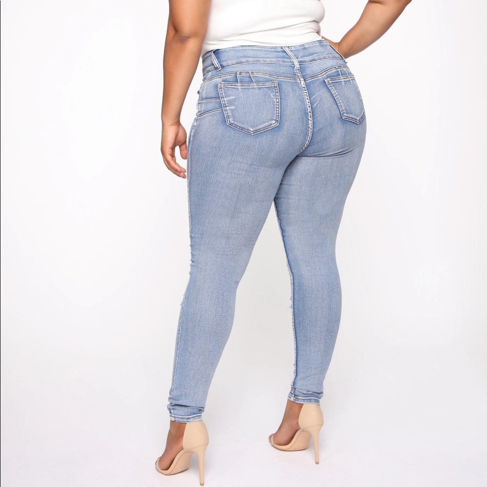Distressed booty lifting mid rise jeans - Picture 7 of 10